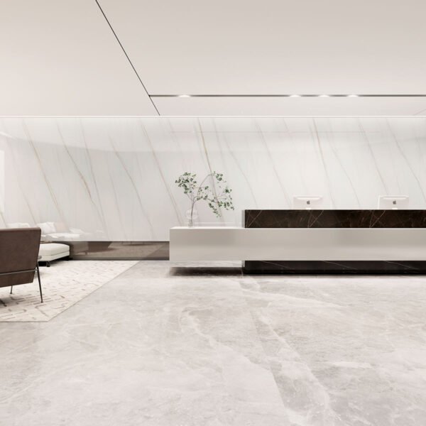 tapiz pvc autoadherible tipo marmol tekno step modelo luxor instalado en recepcion, rollo 1200x2400 mm pieza 2 mm espesor, acabado elegante, autoadherible y de facil limpieza