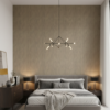 Papel tapiz beige con líneas verticales con destellos dorados | Shine 92-0706