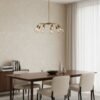 Papel tapiz beige efecto concreto con destellos dorados | Shine 92-3406